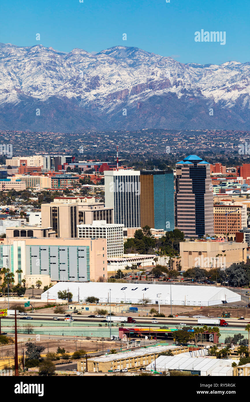 View of downtown Tucson, Arizona snow-capped snow on the Santa Catalina Mountains in the distance. Stock Photo