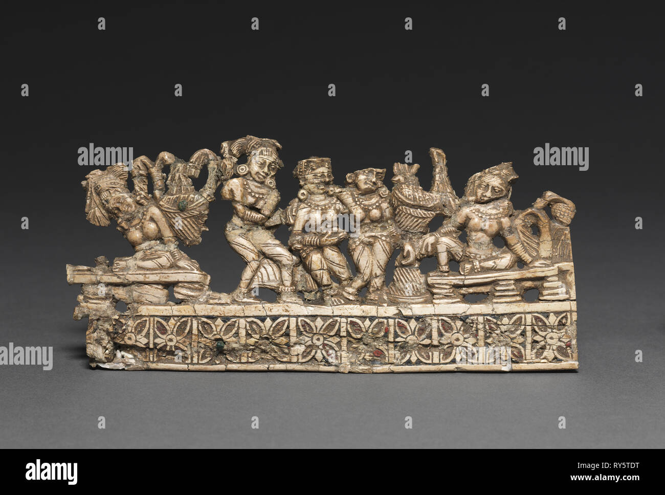 Ladies Entertained by Dancers, 1-200. Afghanistan, Begram, Kushan Period (1st century-320). Ivory; overall: 7.5 x 17 cm (2 15/16 x 6 11/16 in Stock Photo