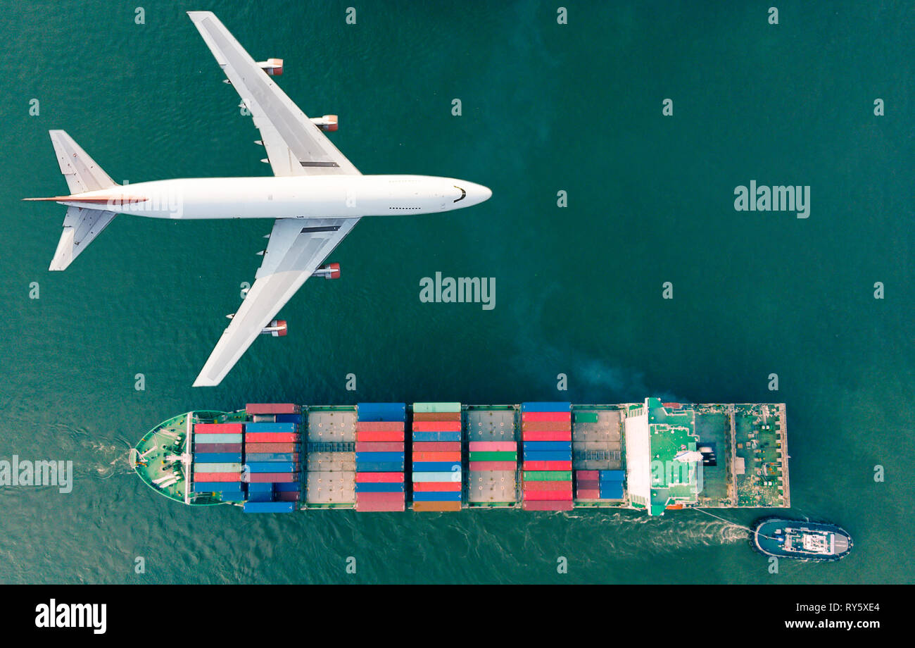 Aerial view logistics and transportation of Container Cargo ship and Cargo plane  for import export and transportation background. Stock Photo