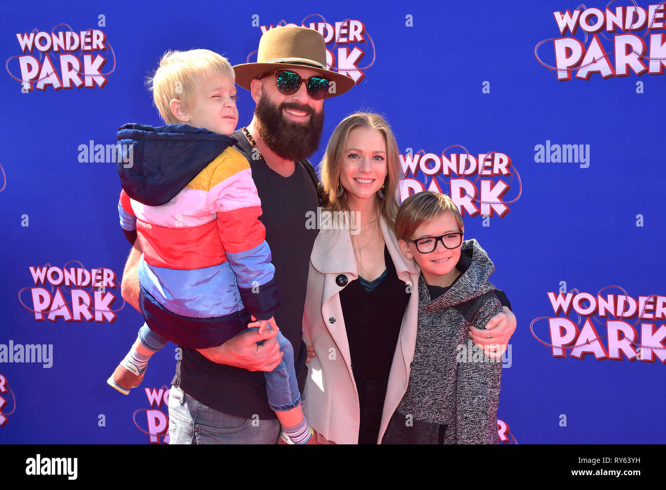 AJ Cook with husband Nathan Andersen and Sohnen Phoenix Sky Andersen and Mekhai Allan Andersen at the premiere of the animated film 'Wonder Park / Welcome to Wonder Park' at the Regency Village Theater. Los Angeles, 10.03.2019 | usage worldwide Stock Photo