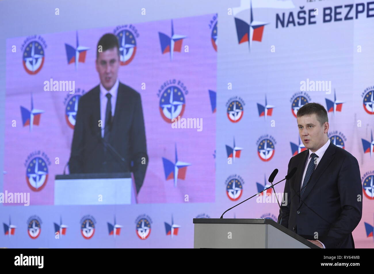 Prague, Czech Republic. 12th Mar, 2019. Czech Minister of Foreign Affairs Tomas Petricek holds a speech at the conference Our Security Is Not Taken For Granted, held at Prague Castle, Prague, Czech Republic, on Tuesday, March 12, 2019, on the occasion of 20th anniversary of the Czech Republic's joining NATO, to be attended by presidents of Hungary, Poland and Slovakia, Janos Ader, Andrzej Duda and Andrej Kiska, defence and foreign ministers of Visegrad Four, current and former senior officials of NATO and USA, diplomatic corps. Credit: Ondrej Deml/CTK Photo/Alamy Live News Stock Photo
