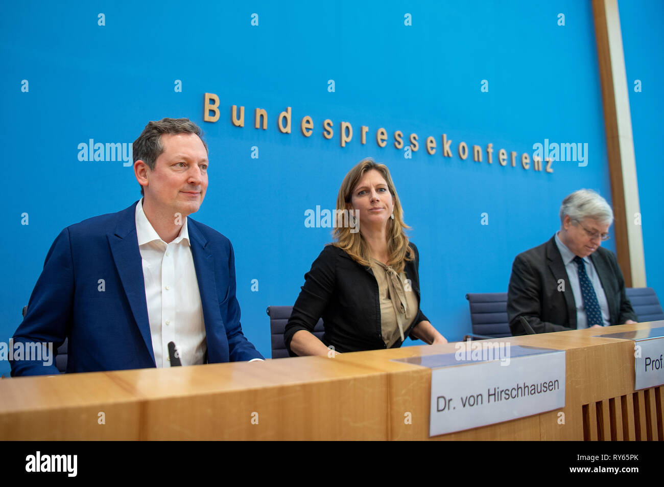 Berlin, Germany. 12th Mar, 2019. Eckart von Hirschhausen (l), doctor and science journalist, and Maja Göpel, Secretary General of the German Advisory Council on Global Change, speak at a press conference on the protests for climate protection by schoolchildren. Thousands of pupils in Germany want to take part in demonstrations for better climate protection next Friday as well. Credit: Monika Skolimowska/dpa-Zentralbild/dpa/Alamy Live News Stock Photo