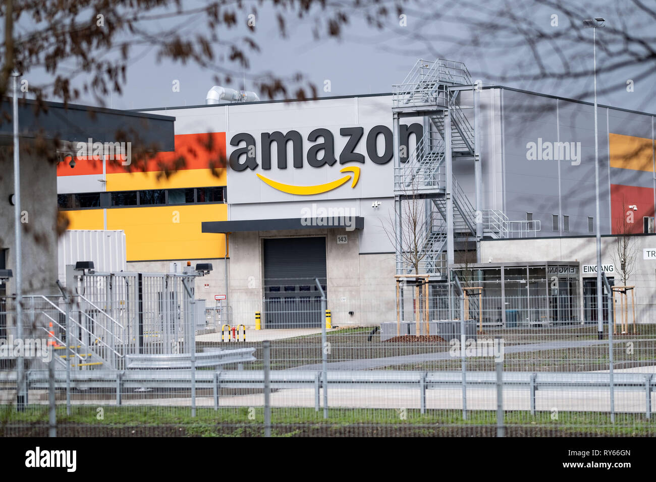 12 March 2019, Lower Saxony, Garbsen: The name of the parcel sender Amazon can be seen at the sorting centre in Garbsen. Amazon sorts the parcels in Garbsen by delivery area and then forwards them to parcel shippers. Amazon already operates a logistics centre in Winsen in Lower Saxony. 700 jobs are to be created in Garbsen near Hanover. Photo: Peter Steffen/dpa Stock Photo