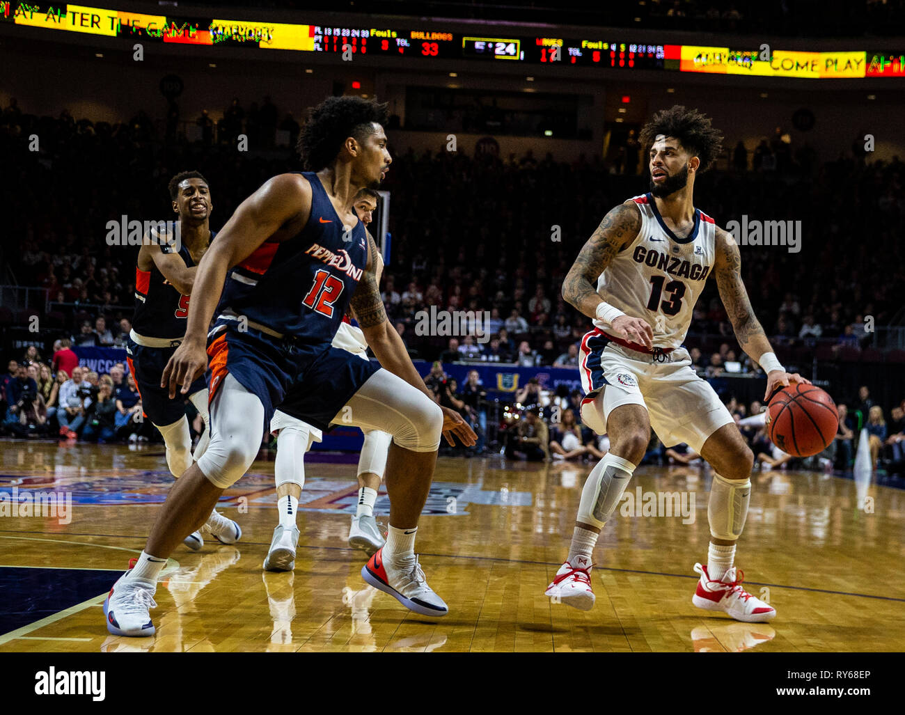 Mar 11 2019 Las Vegas, NV, U.S.A. Gonzaga guard Josh Perkins (13) looks to pass the ball during the NCAA West Coast Conference Men's Basketball Tournament semi -final between the Pepperdine Wave and the Gonzaga Bulldogs 100-74 win at Orleans Arena Las Vegas, NV. Thurman James/CSM Stock Photo