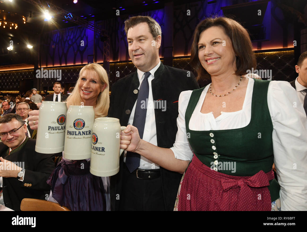 12 March 2019, Bavaria, München: Ilse Aigner (CSU. r-l), President of the  Bavarian State Parliament, Markus Söder (CSU), Bavarian Prime Minister and  his wife Karin, taken at a strong beer tapping on