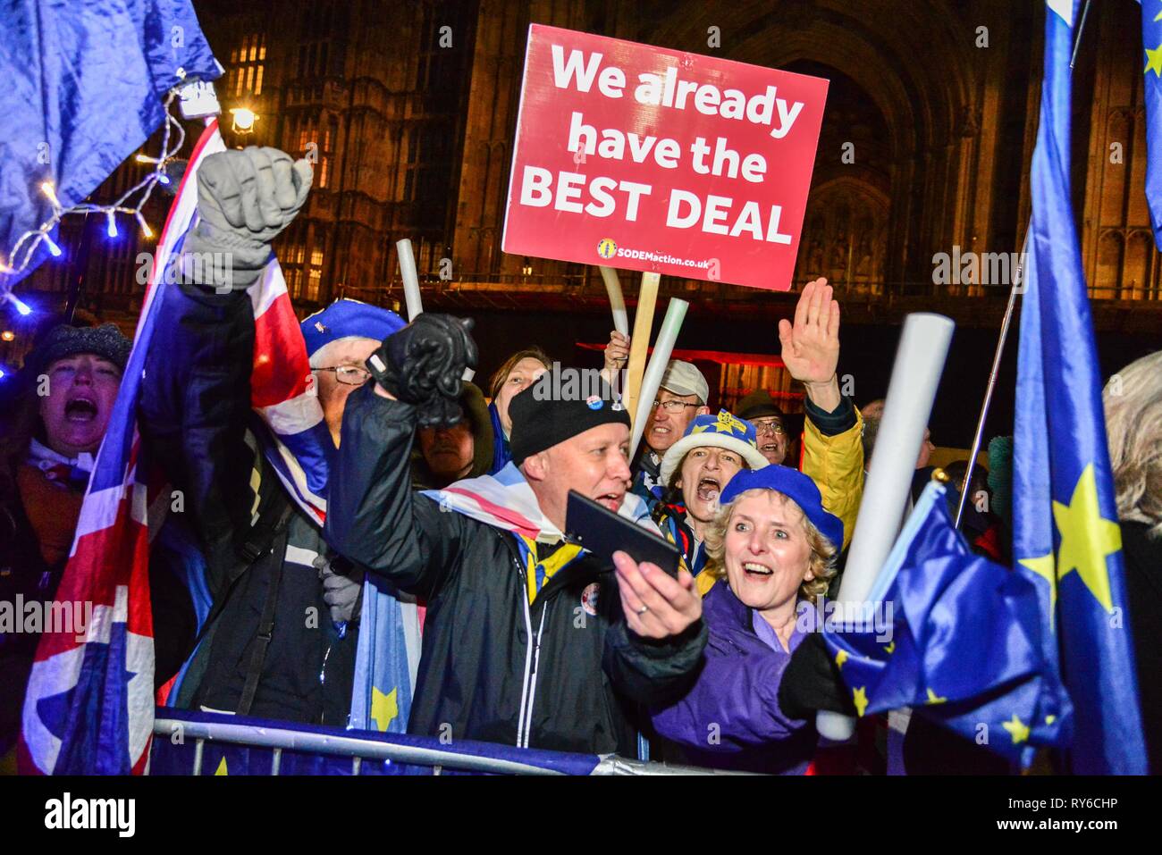 London, UK. 12th Mar, 2019. Remain campaigners watch the Brexit vote ...