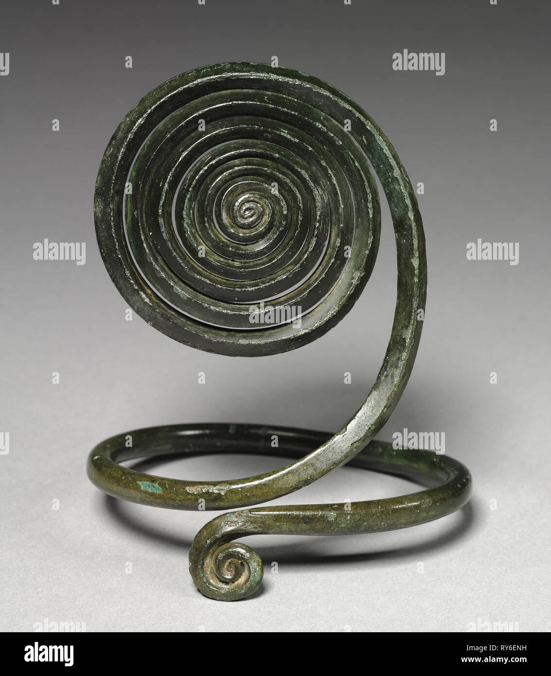 Spiral Armilla, c. 1500 BC. Central Europe, Bronze Age, c. 2500-800 BC. Bronze, wrought; overall: 16.5 x 12.1 cm (6 1/2 x 4 3/4 in Stock Photo