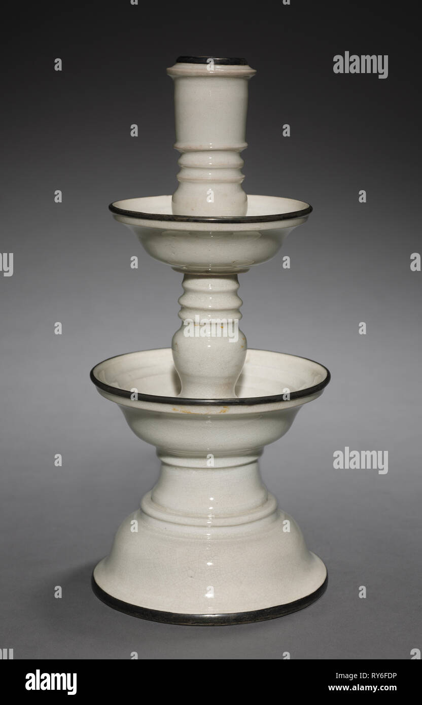 Candlestick, 1600s. China, Ming dynasty (1368-1644). Glazed porcelain with metal rims; overall: 32.4 cm (12 3/4 in Stock Photo