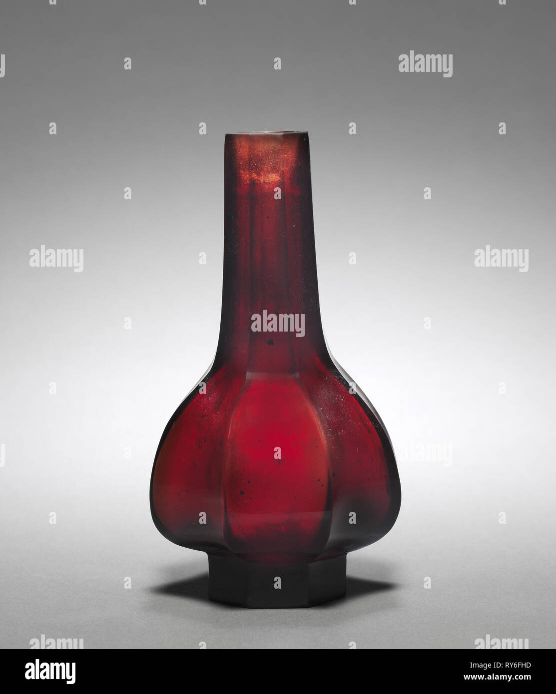 https://c8.alamy.com/comp/RY6FHD/faceted-bottle-1736-1795-china-qing-dynasty-1644-1911-qianlong-mark-and-reign-1736-1795-red-peking-glass-diameter-8-cm-3-18-in-overall-141-cm-5-916-in-RY6FHD.jpg