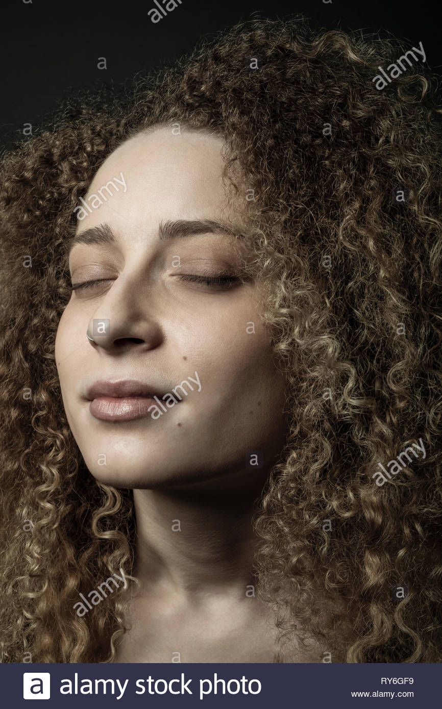 Woman beauty curly hair hi-res stock photography and images - Alamy