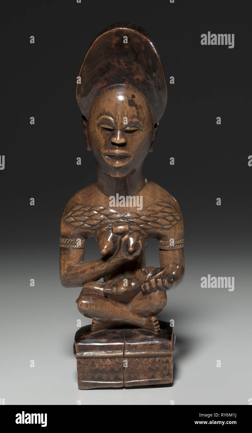 Mother-and-Child Figure, mid to late 1800s. Central Africa, Democratic Republic of the Congo, Yombe, mid to late 19th century. Wood; overall: 26 cm (10 1/4 in Stock Photo