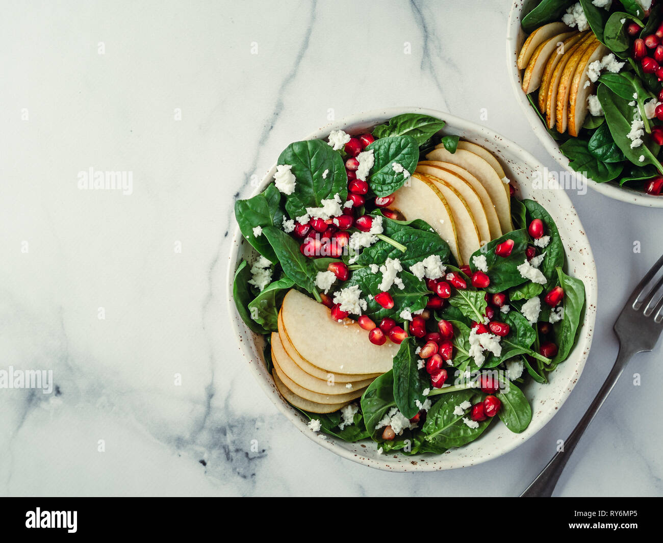 Fresh Salad With Baby Spinach Pear Pomegranate And Cottage