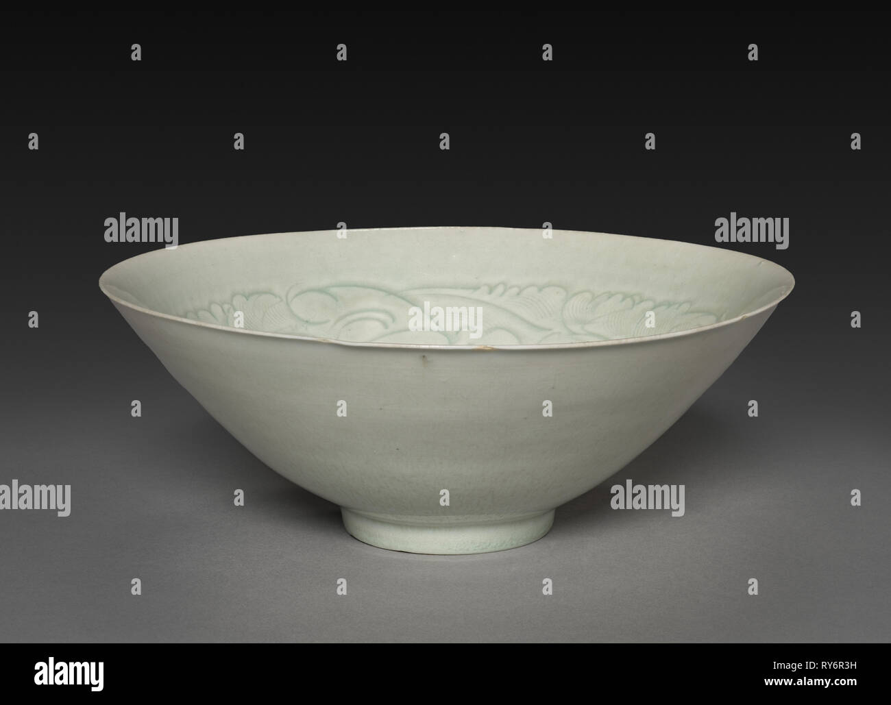 A fine Chinese qingbai conical bowl with incised floral design