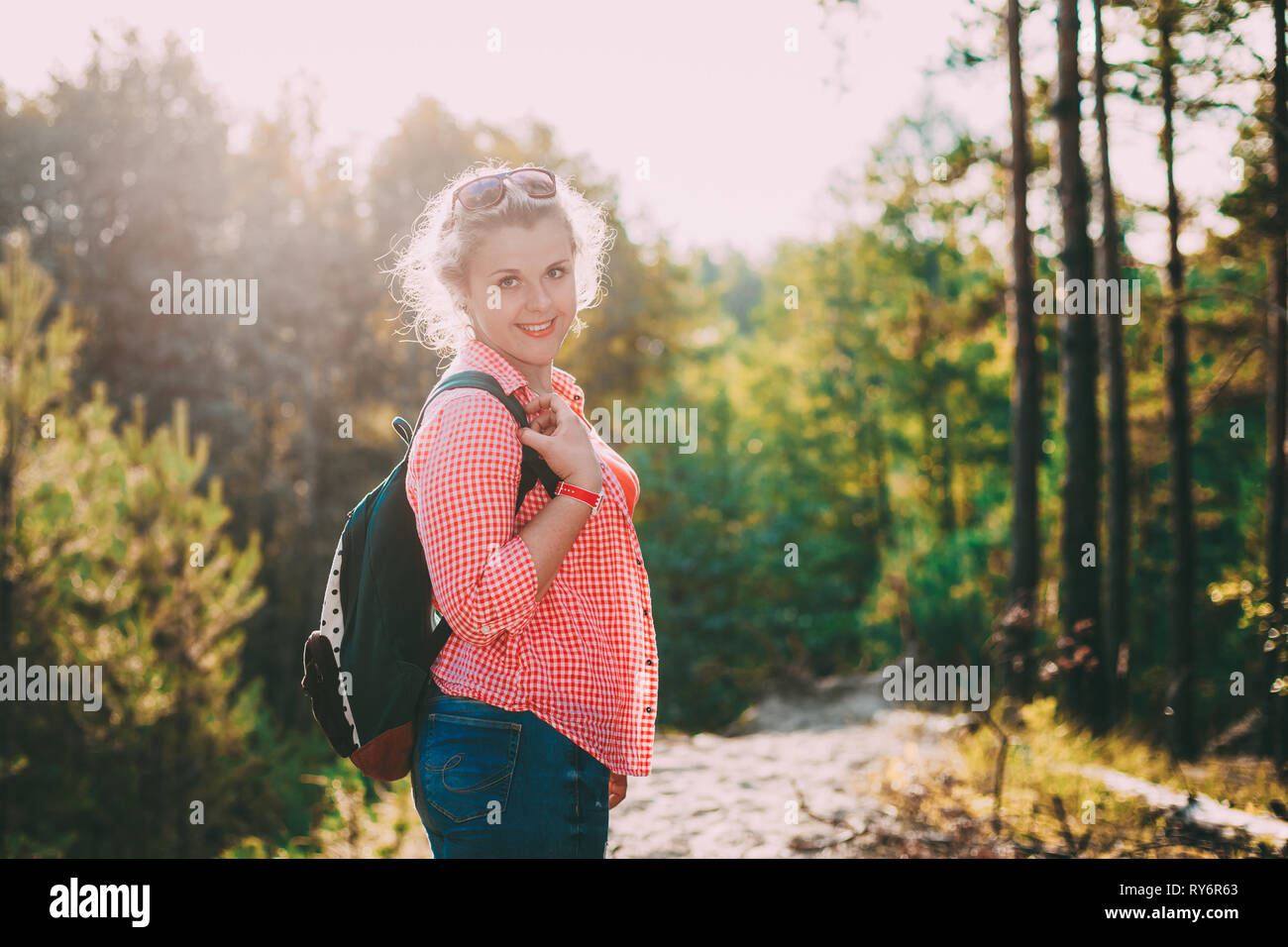 Close Up Beautiful Plus Size Young Smiling Woman In Shirt Posing In Summer Forest Stock Photo
