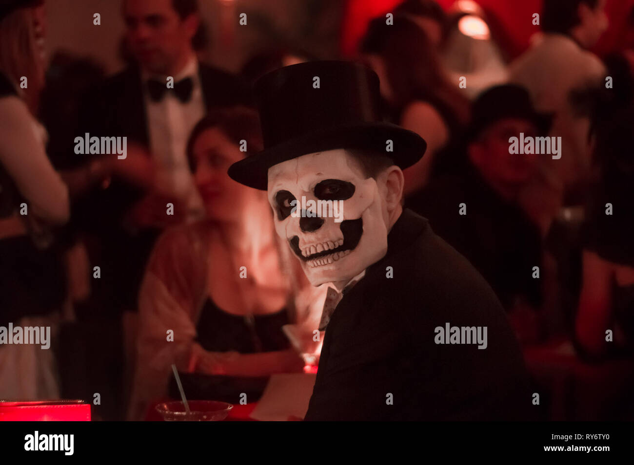 Tuxedo Man in Top hat and Skull Makeup at Shanghai Mermaid Party, New York City Stock Photo