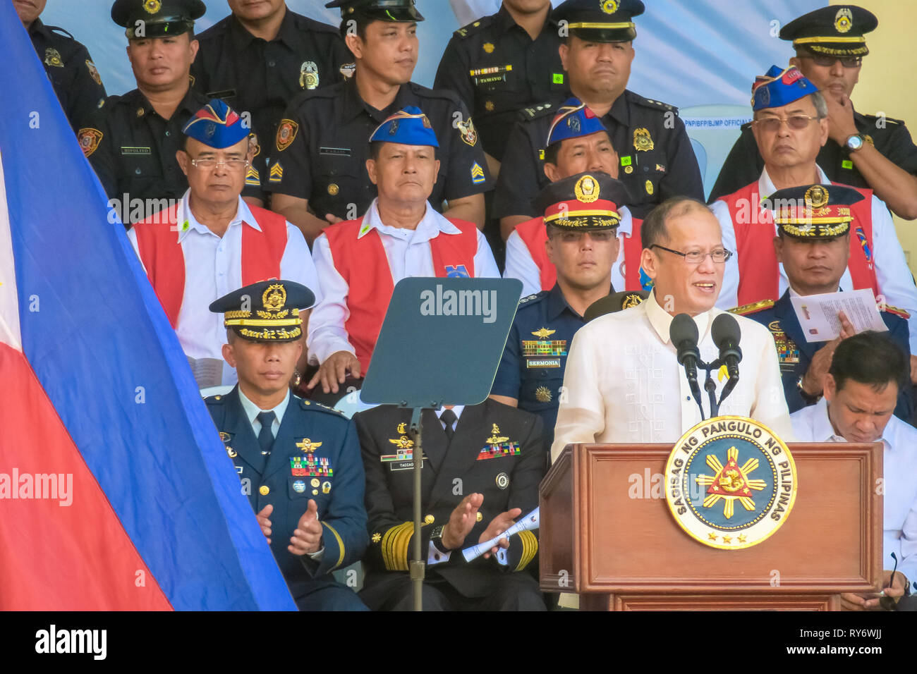 Benigno Aquino III, the 15th President of the Philippines, speaking near a Filipino flag at the 74th Bataan Day Anniversary - Mount Samat, Philippines Stock Photo