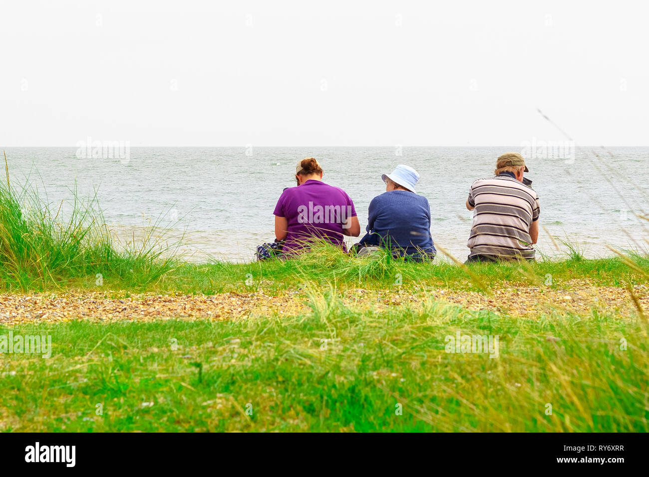 Family at beach back view uk hi-res stock photography and images - Alamy