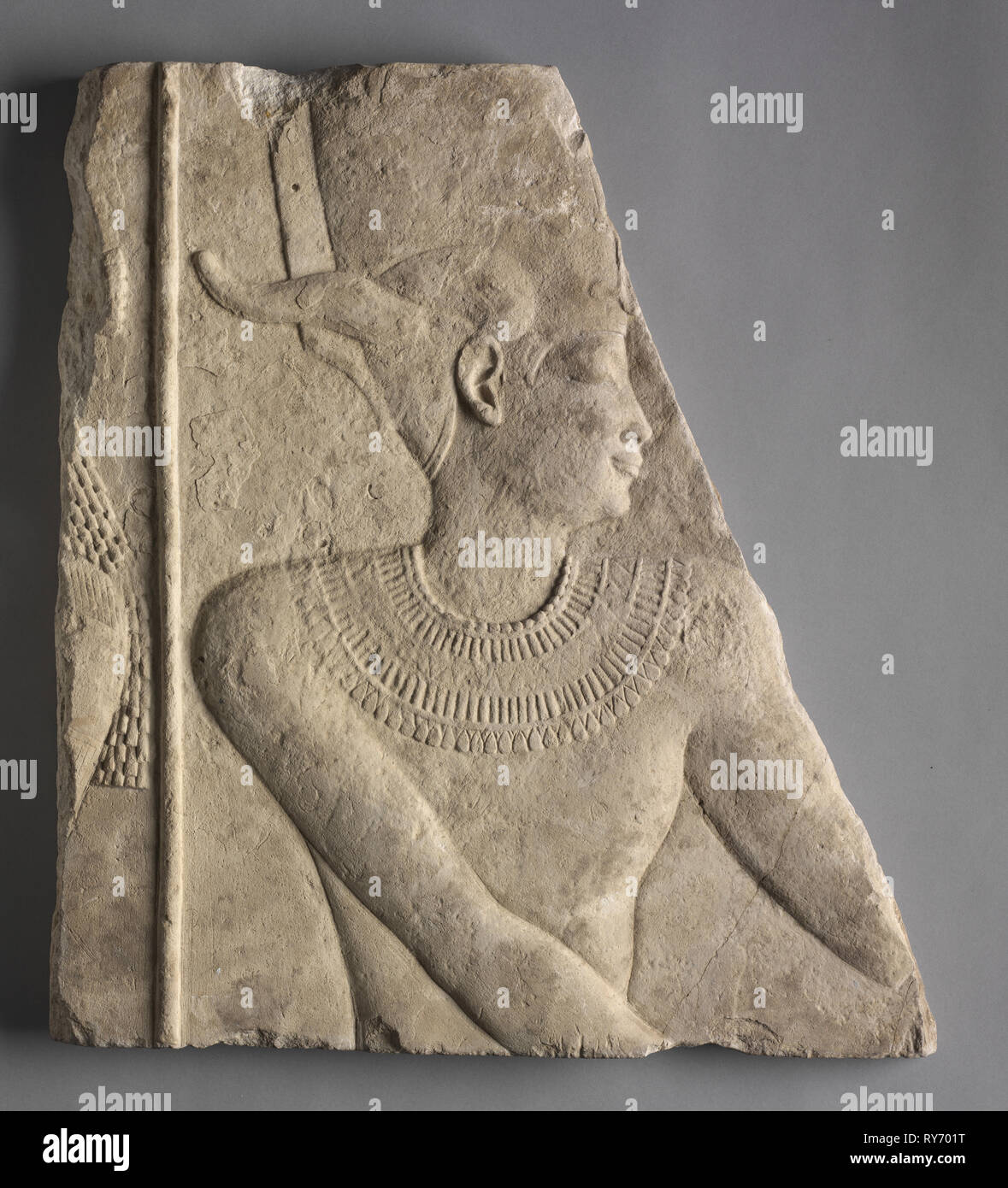 Temple Relief of a Deity, 360-246 BC. Egypt, Greco-Roman Period, Late Dynasty30 to early Ptolemaic Dynasty. Limestone; overall: 47.3 x 41 cm (18 5/8 x 16 1/8 in Stock Photo