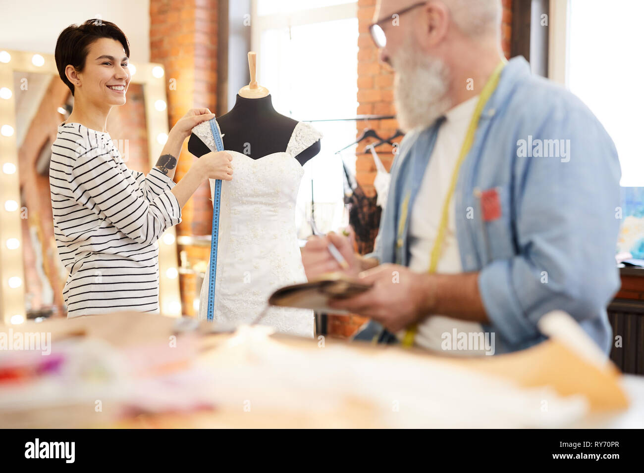 Tailor working dress studio hi-res stock photography and images - Alamy