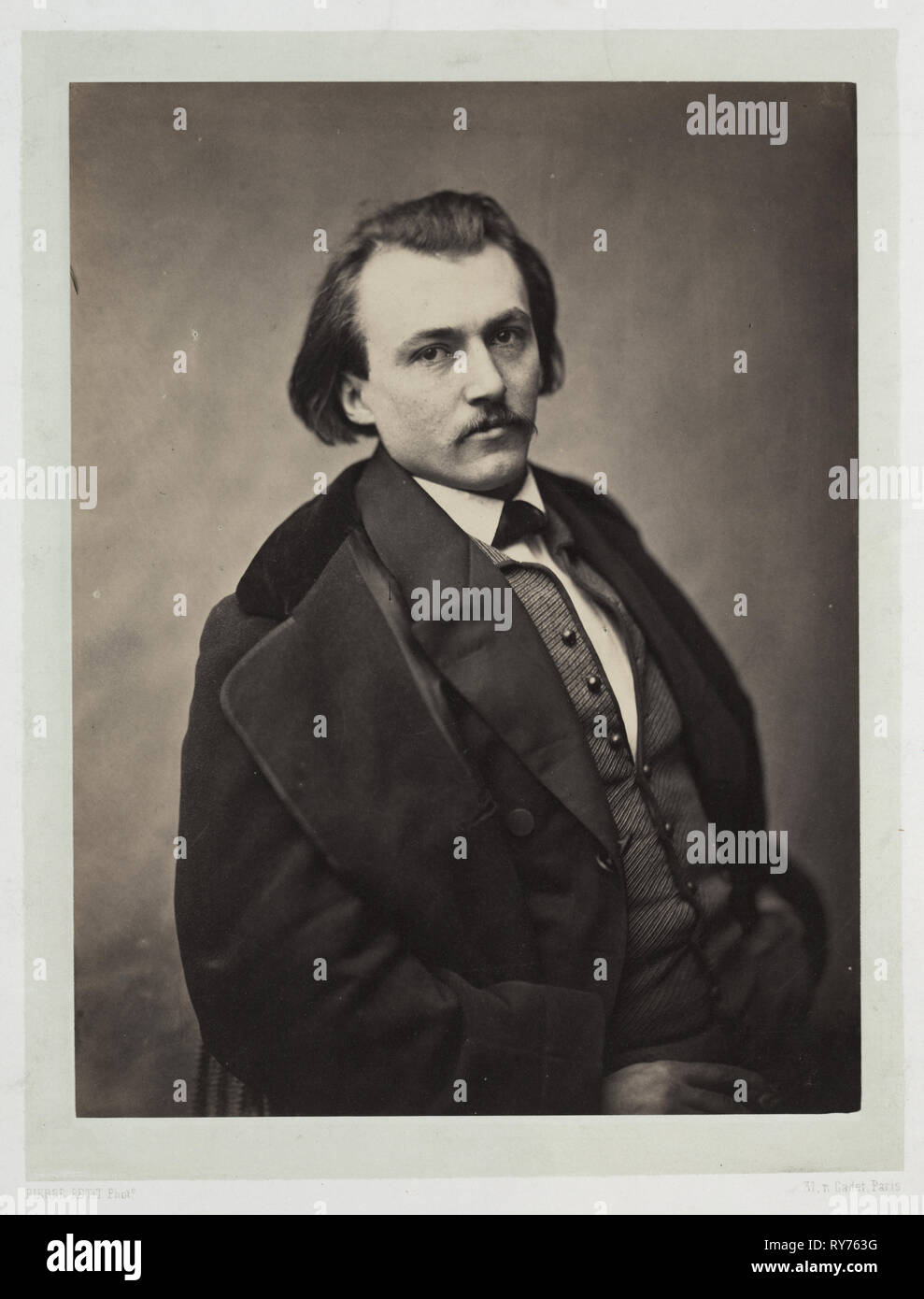 Gustave Doré, 1860. Pierre Petit (French, 1832-1909). Albumen print from wet collodion negative; image: 25 x 19 cm (9 13/16 x 7 1/2 in.); paper: 48.1 x 31 cm (18 15/16 x 12 3/16 in.); matted: 55.9 x 45.7 cm (22 x 18 in Stock Photo