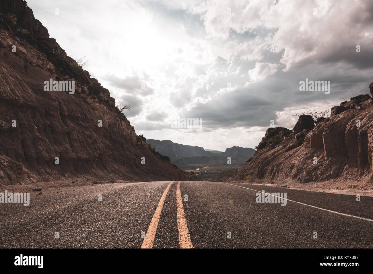 Passage through the desert mountains of Big Bend, Texas as a storm rolls in. Stock Photo