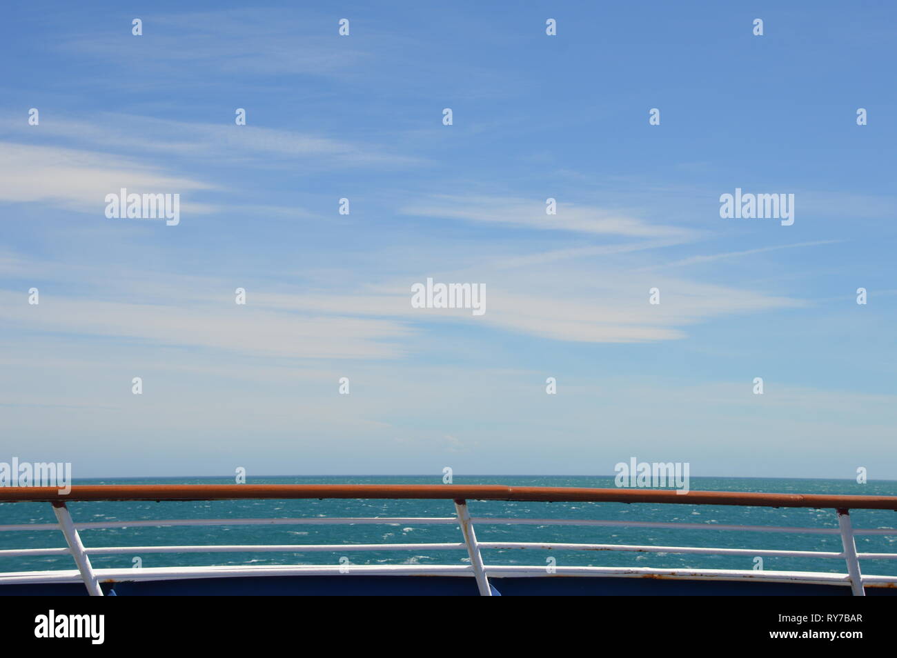 view from a ferryboat over the reling into the slightly cloudy endless sky   views on Tasman Sea Stock Photo