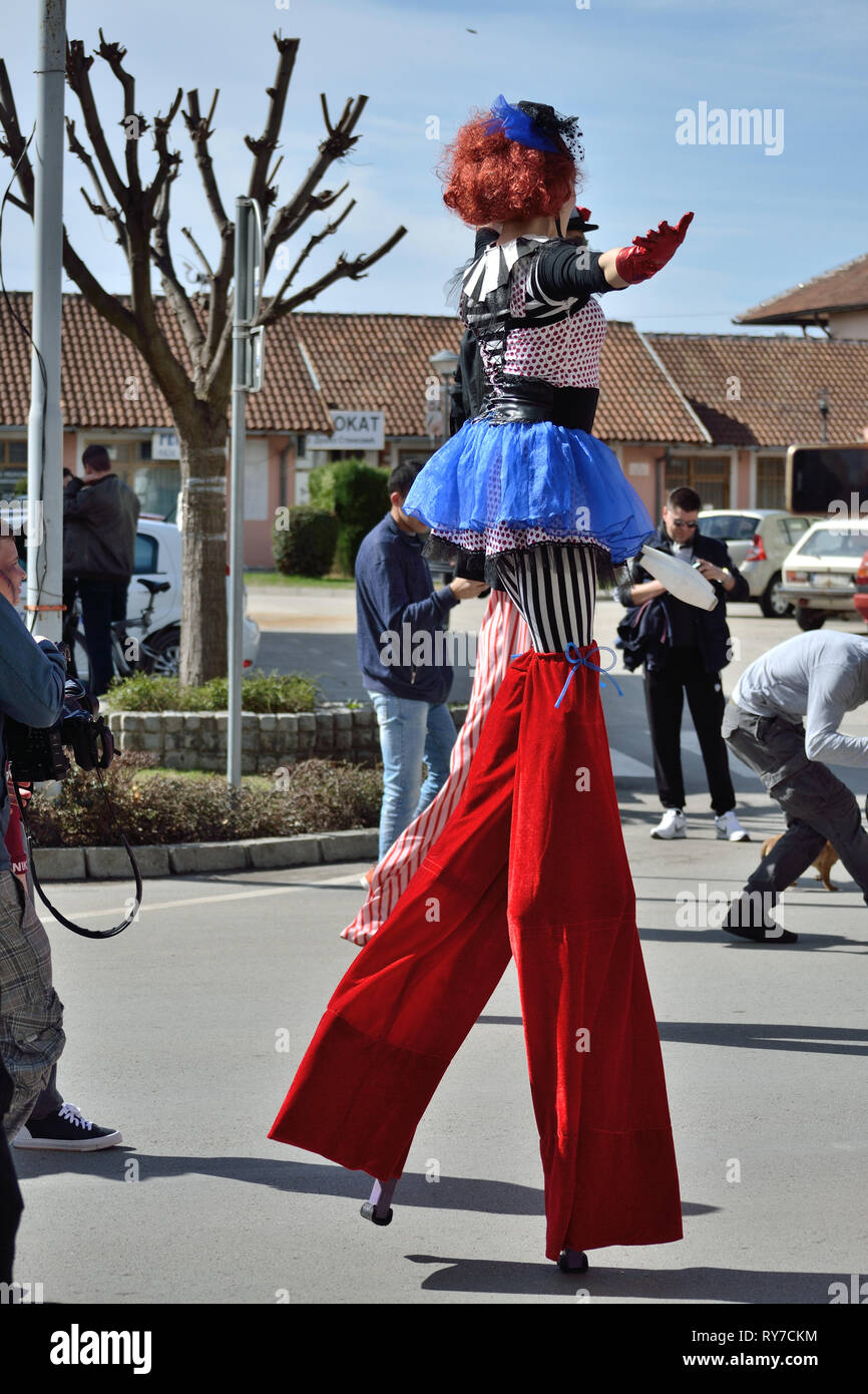 Clown stilts hi-res stock photography and images - Alamy