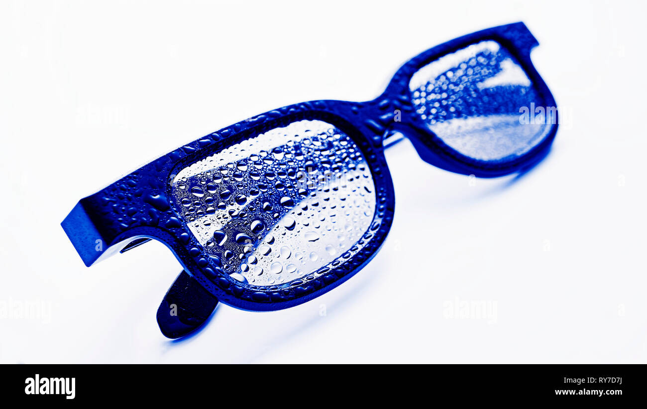 Sunglasses with dew drops, blue glasses. Concept summertime, eye