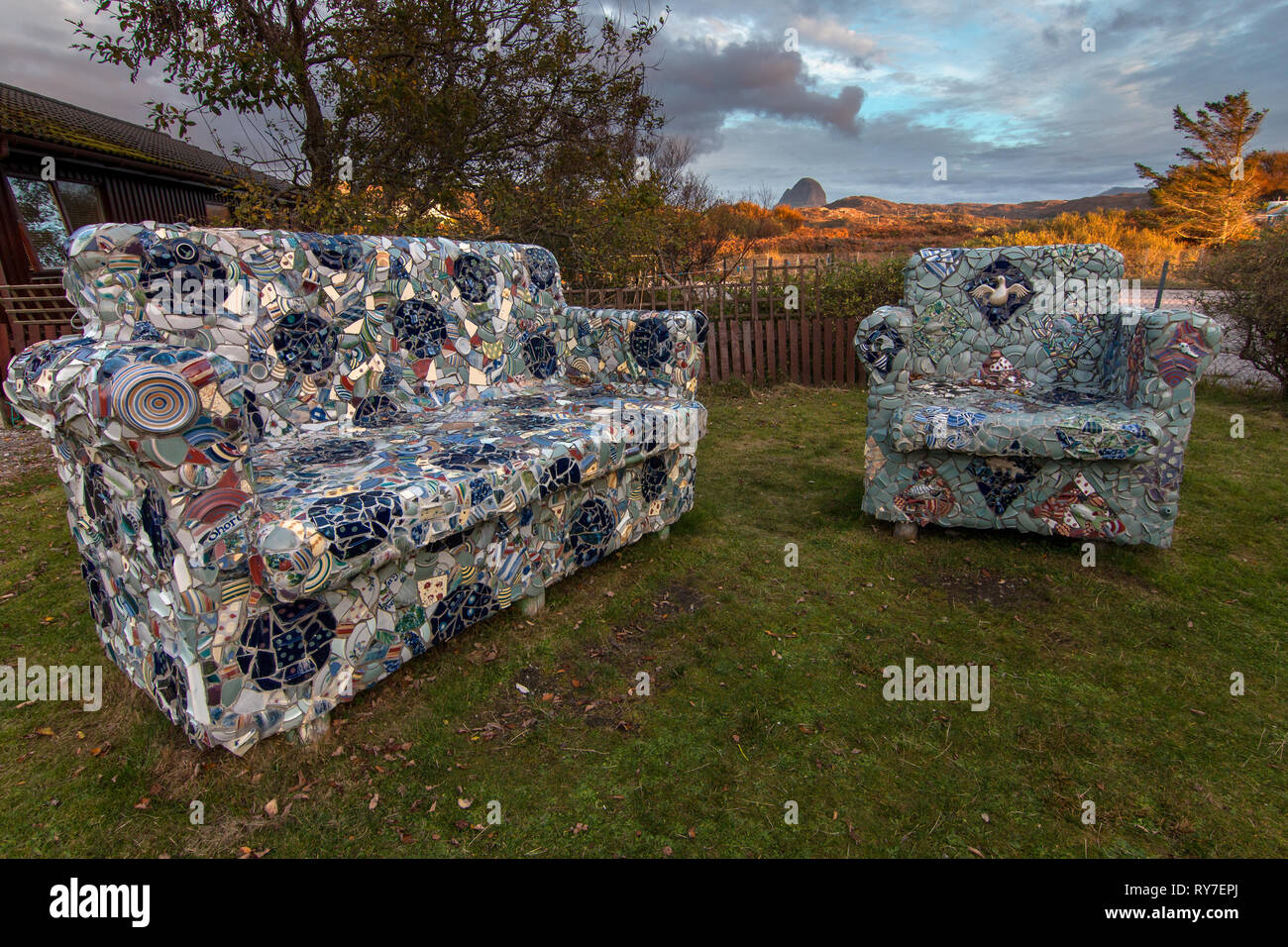 Highland Stoneware pottery art work of a couch TV and a Chair in Scotland Stock Photo