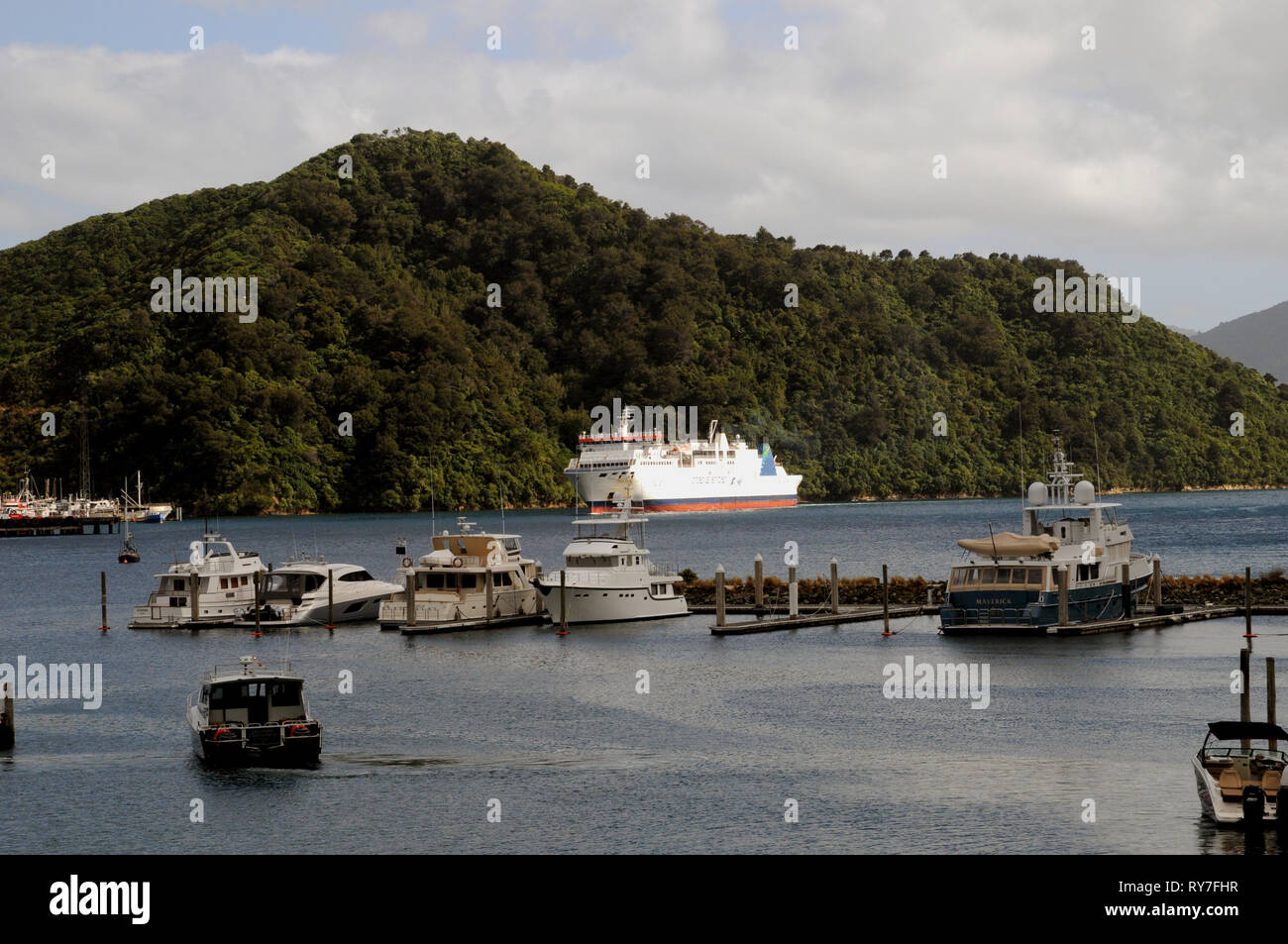 The InterIslander leaving Picton to cross the Cook Strait, connecting New Zealand's North and South Islands. The ferry carries passengers and freight. Stock Photo