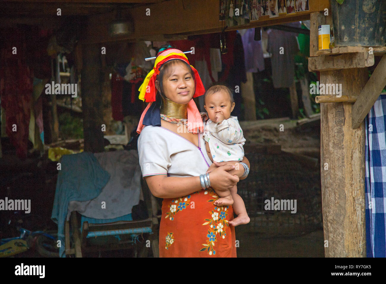 Portrait of Kayan woman with s chiild. Ban Huai Seau Tao village NV Thailand (Mae Hong Son). The Kayan are a group of the Karen people, a Tibeto-Burma Stock Photo