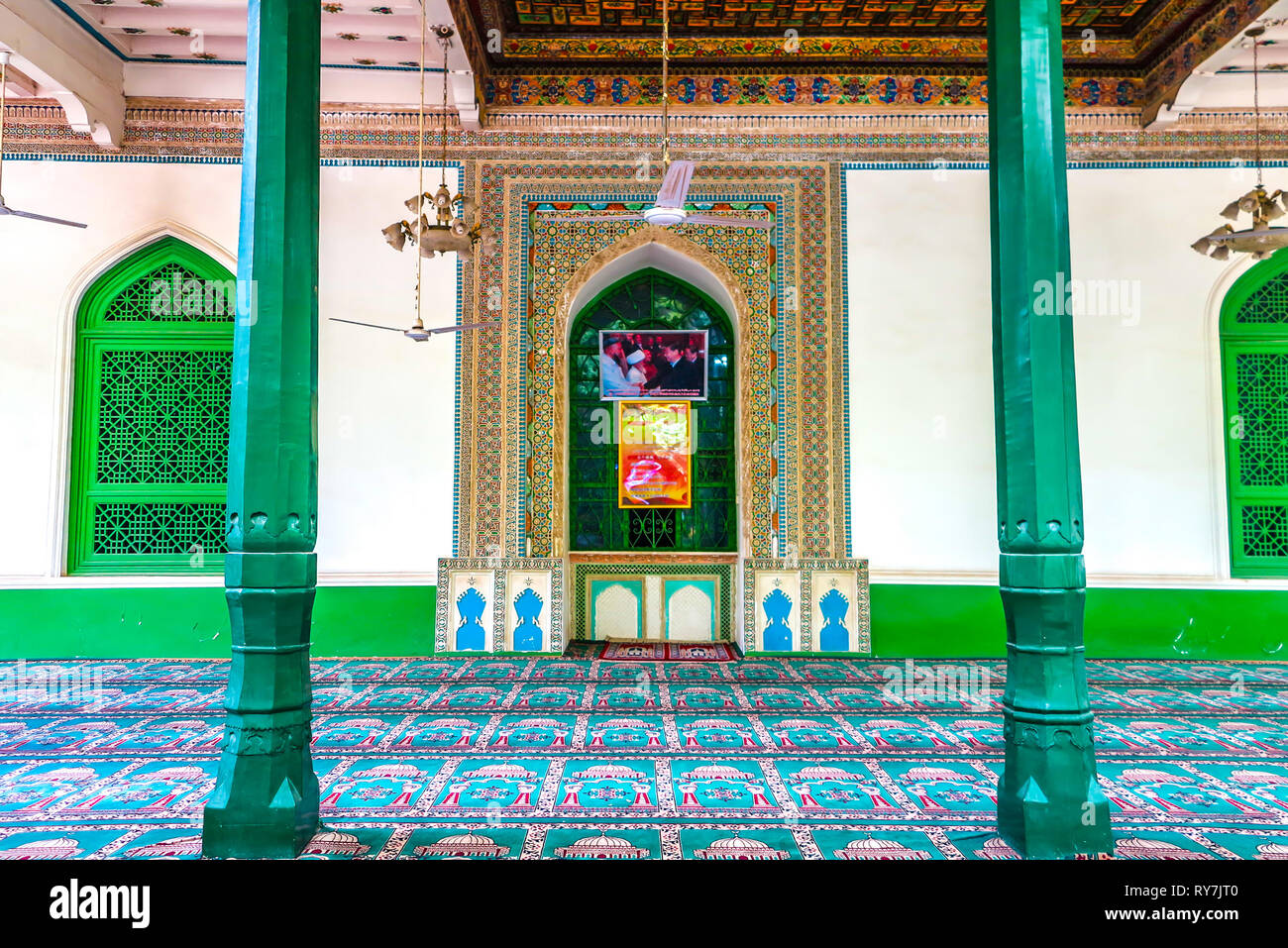Kashgar Id Kah Mosque Green Colored Columns with Carpets for Outdoor Prayers and Mihrab Stock Photo