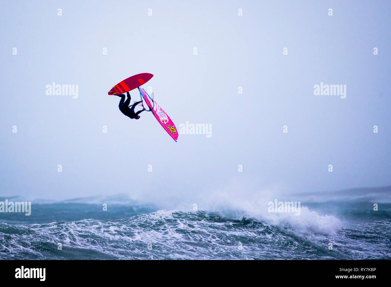 A windsurfer during the Red Bull Storm Chase Challenge at Magheraroarty in  Co. Donegal ahead of Storm Gareth Stock Photo - Alamy