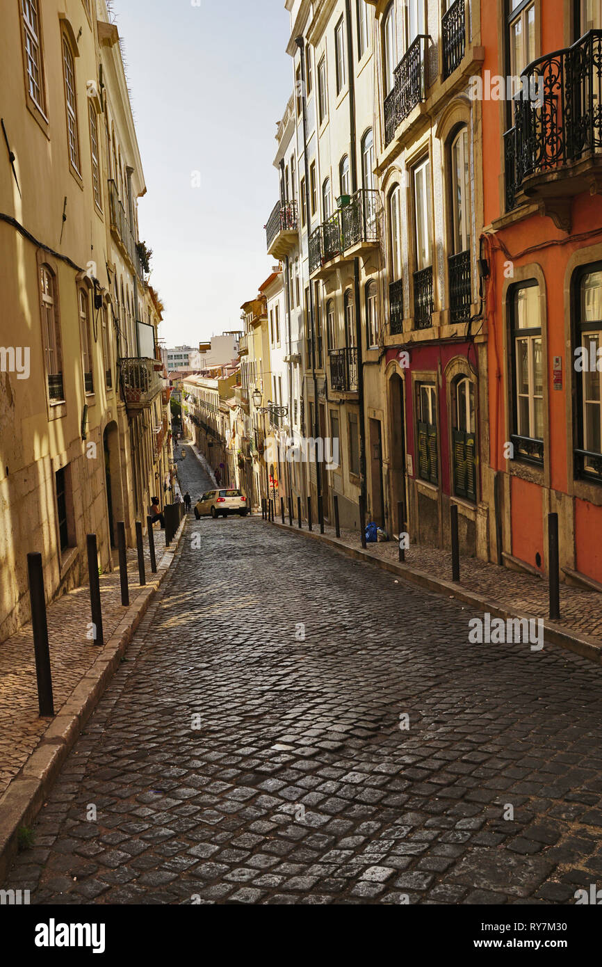 Historic alley in Lisbon at evening light Stock Photo