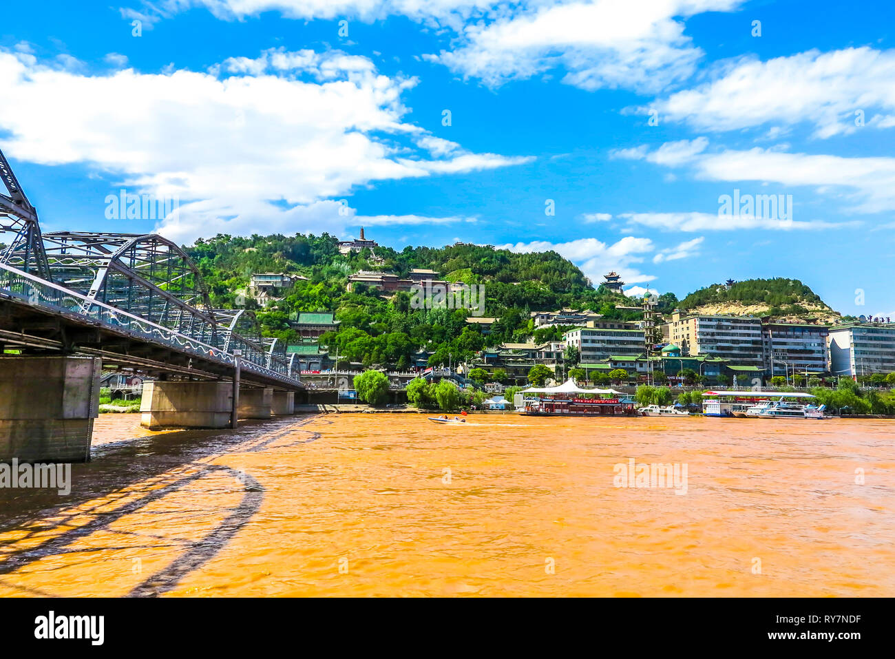 Lanzhou Yellow River Zhongshan Bridge and Mount Baitashan Park Cityscape View Point Stock Photo