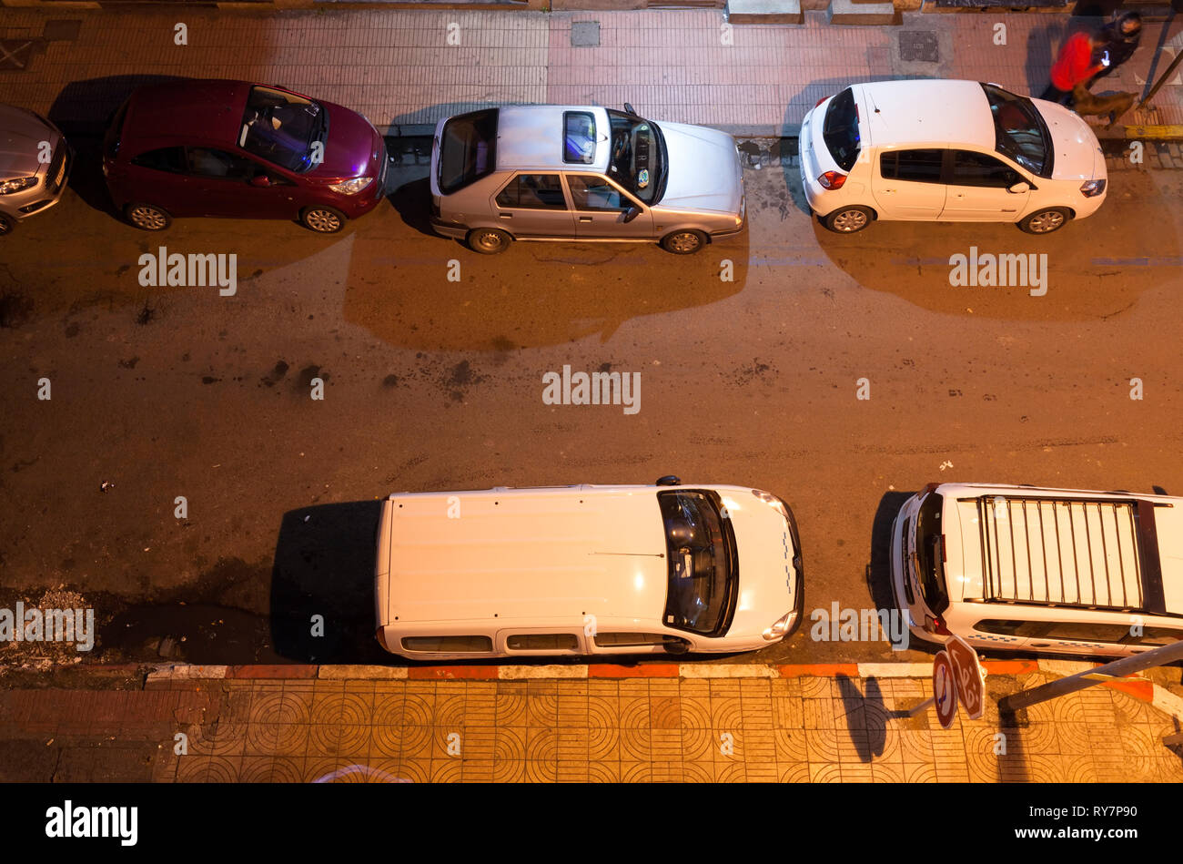 Looking down from above at Rue Abou Soufiane with cars parked along the sides of the street. Casablanca, Casablanca-Settat, Morocco, Africa. Stock Photo