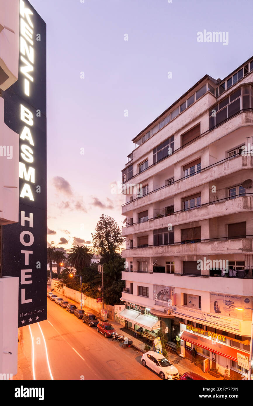 The sign for the Kenzi Basma Hotel overlooking Boulevard Hassan I at sunset. Casablanca, Casablanca-Settat, Morocco, Africa. Stock Photo