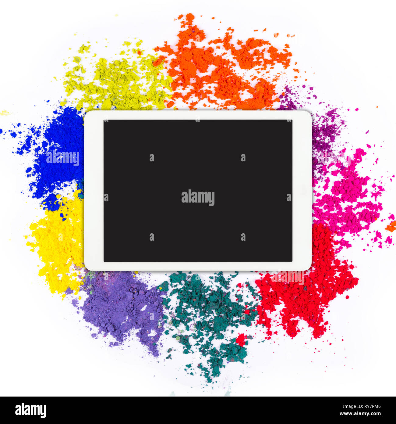 White touchpad with blank screen with colorful powder isolated on white background. Flat lay