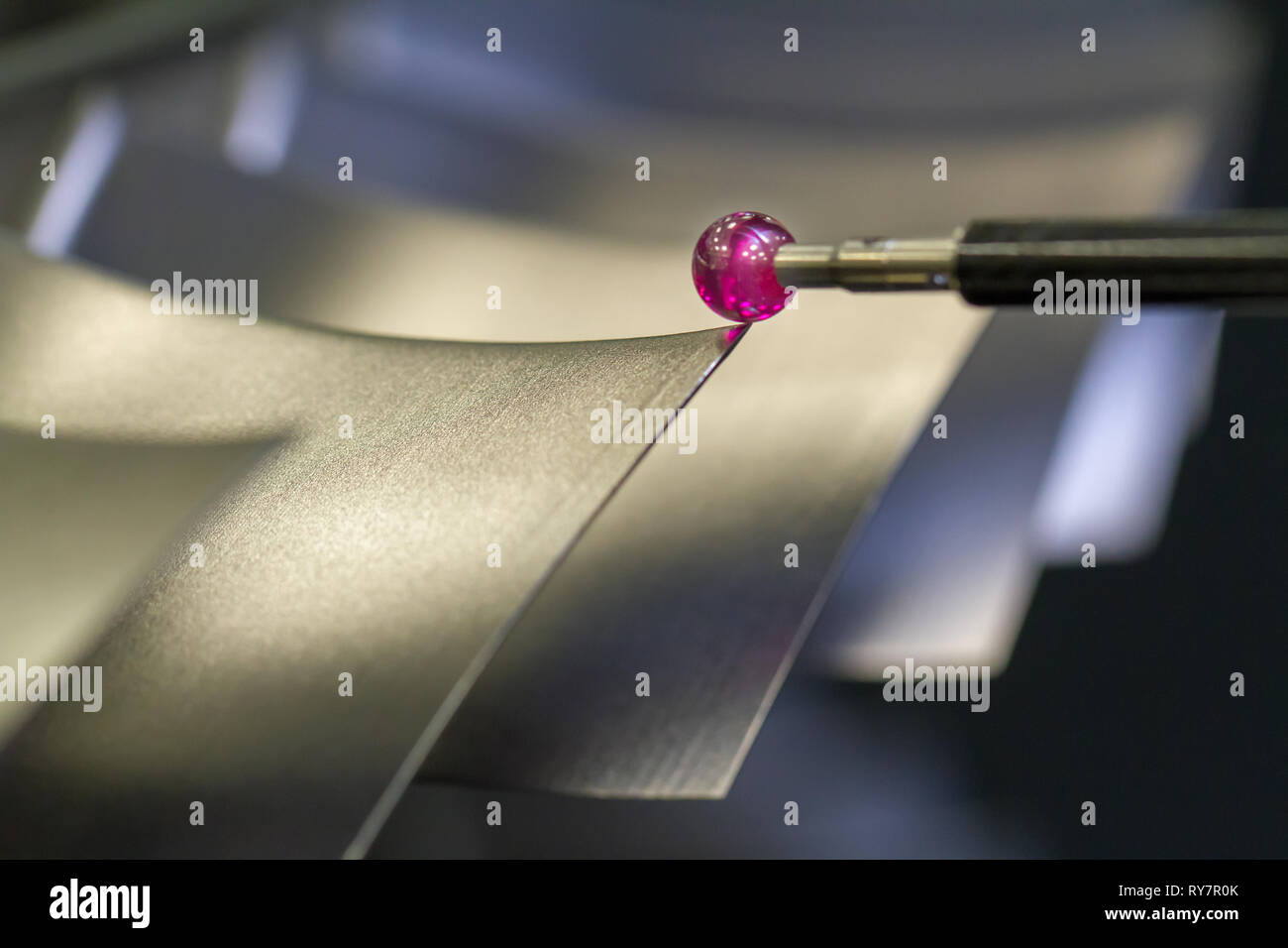 inspect dimension metal parts by CMM after machining process in industrial factory Stock Photo