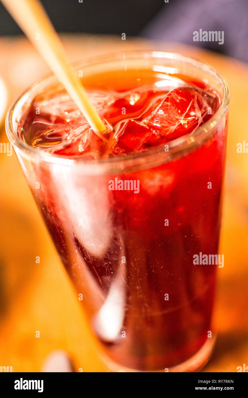 A tall, cool, glass of hibiscus tea. Stock Photo