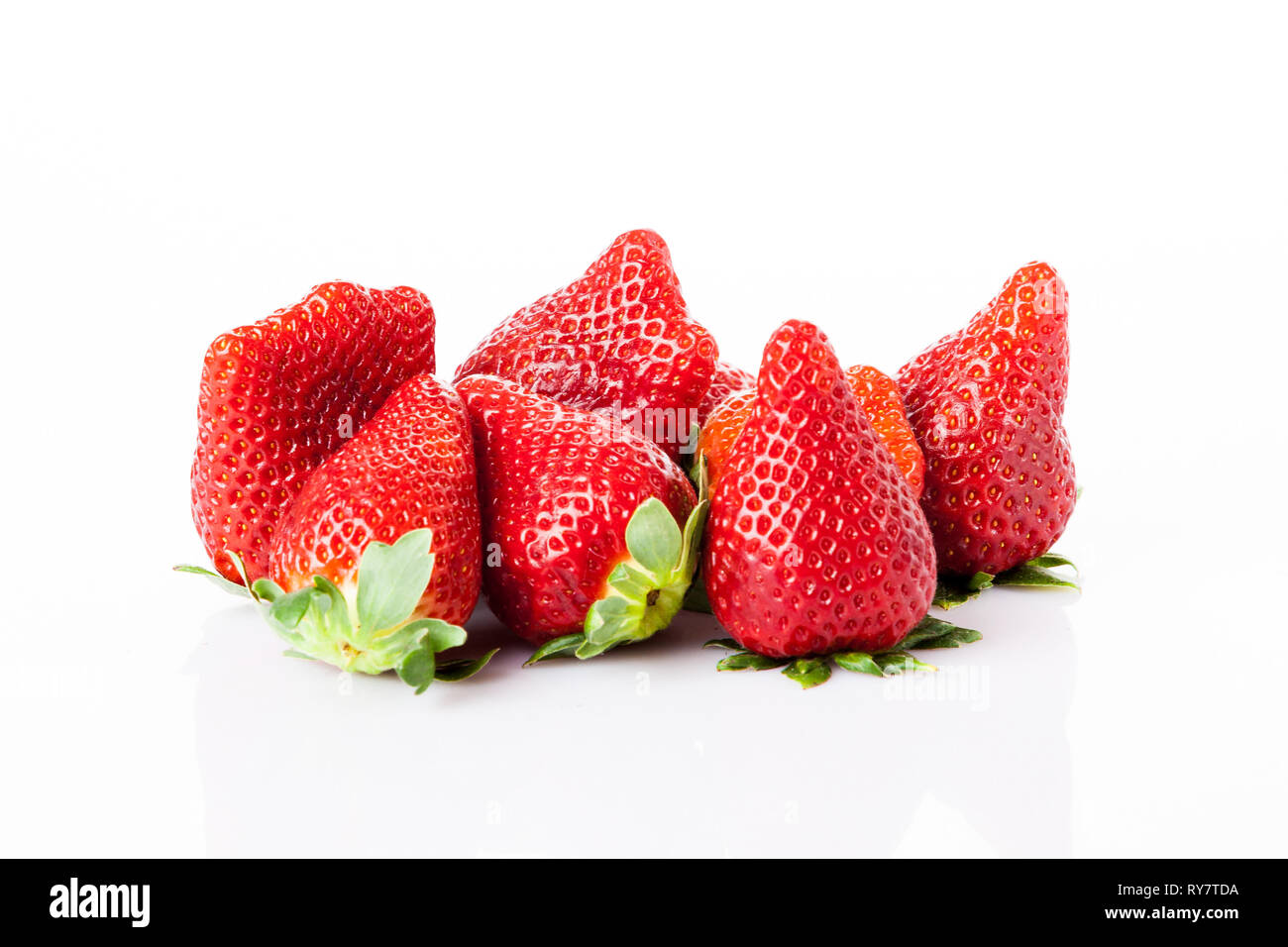 Ripe strawberry isolated on white background Stock Photo - Alamy