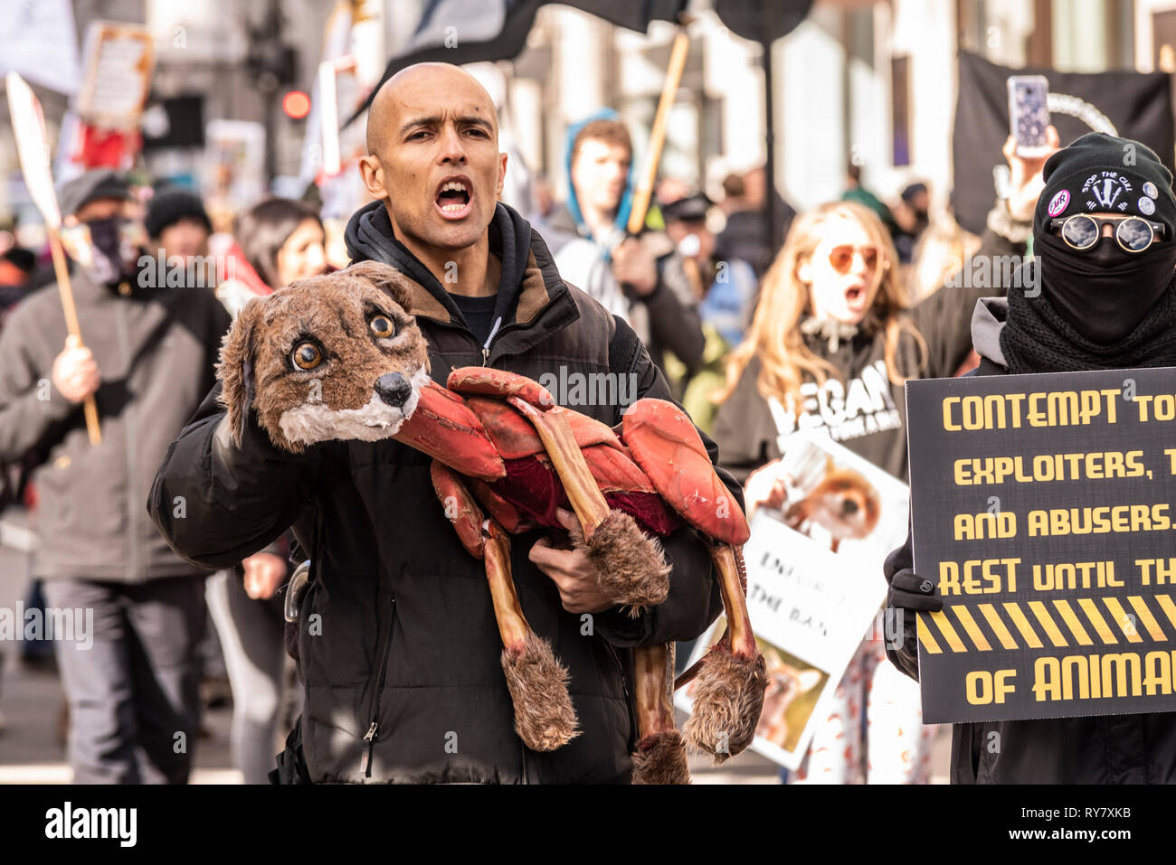Protest march to demonstrate against the lack of enforcement of the fox hunting ban in the UK. Protesters believe that fox hunting still takes place Stock Photo