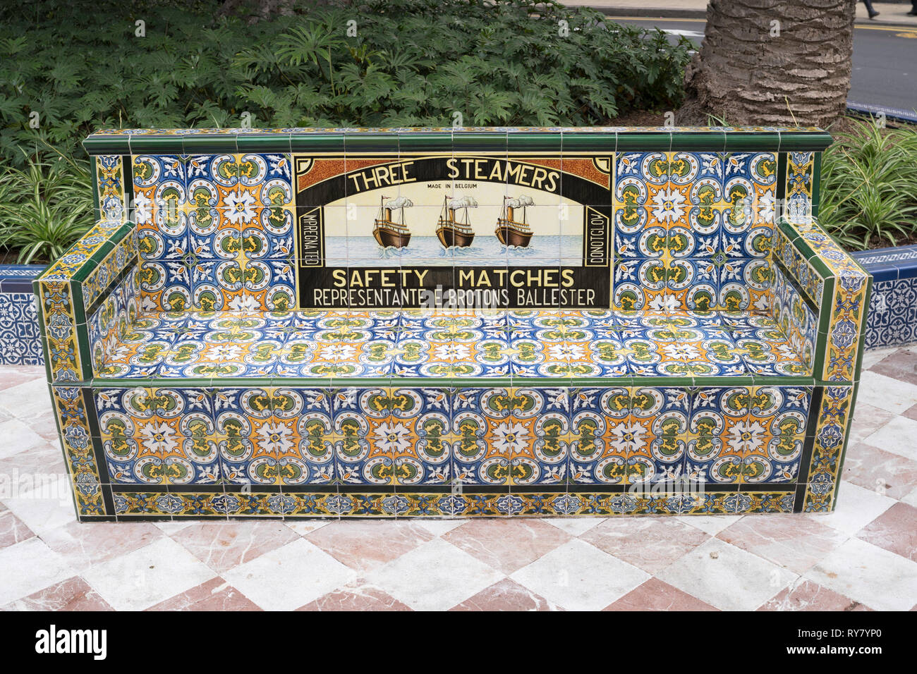 Old Three Steamers Safety Matches advertising slogan on ceramic tiled bench in the  Plaza de Los Patos in Santa Cruz de Tenerife, Tenerife. Stock Photo