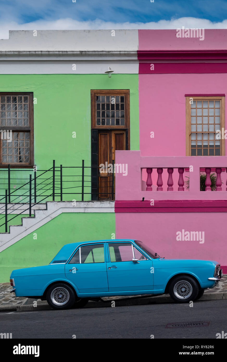 Old Blue Ford Cortina Car in front of Multi Coloured Houses of Bo Kaap, Cape Town, Western Cape, South Africa Stock Photo