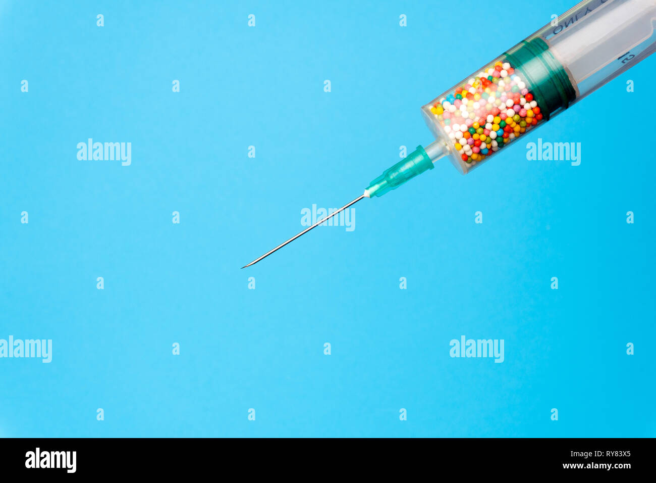 Minimal Creative syringe with color drugs ( vitamins, dyes, antibiotics