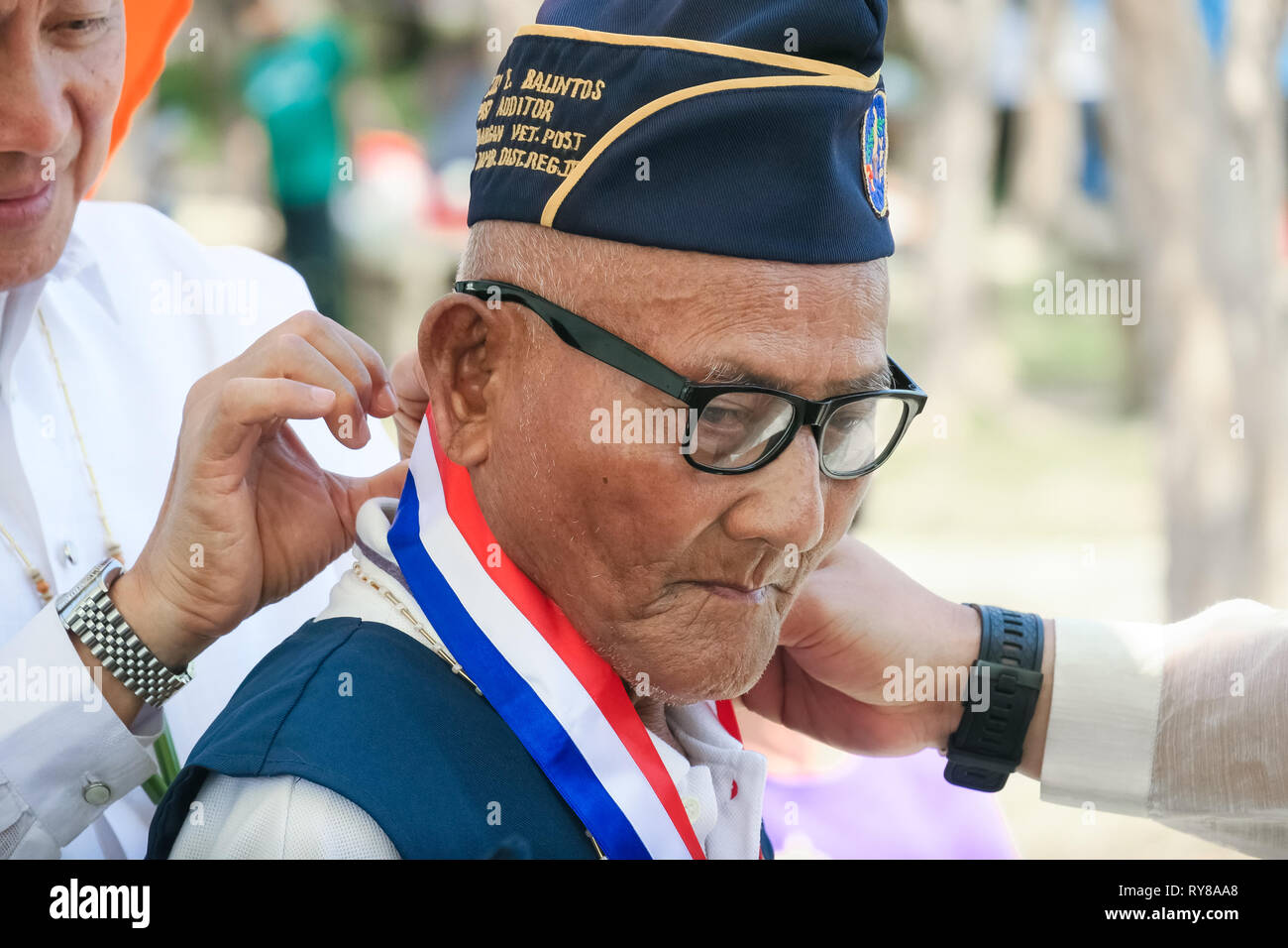 WWII Soldier being Awarded by  Philippine Veterans Affairs Office - 74th Bataan Day Anniversary - Capas Shrine, Tarlac, Philippines Stock Photo