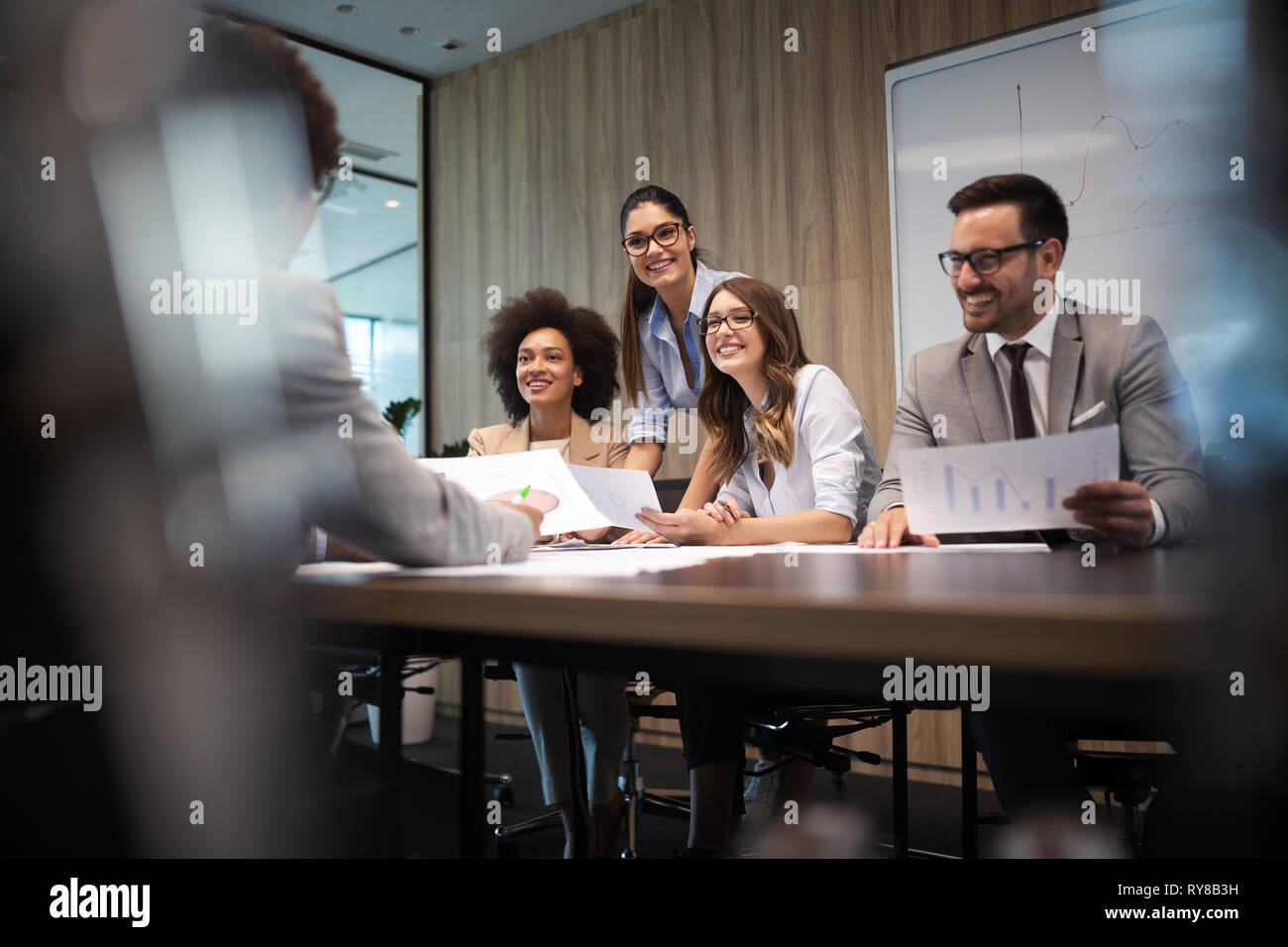 Group of successful business people at work in office Stock Photo - Alamy