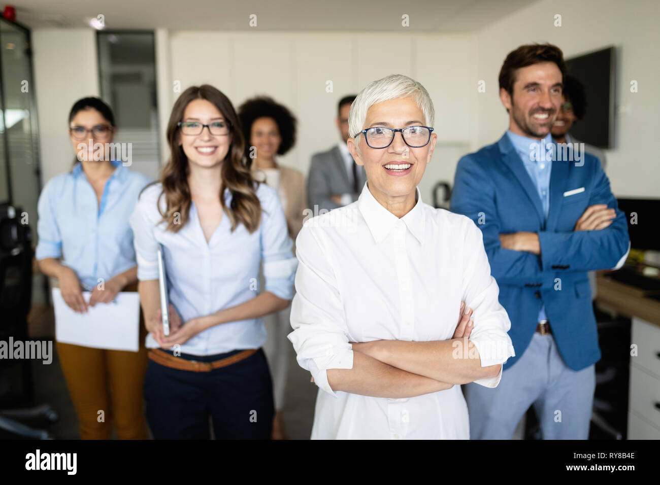 Group of successful business people in office Stock Photo