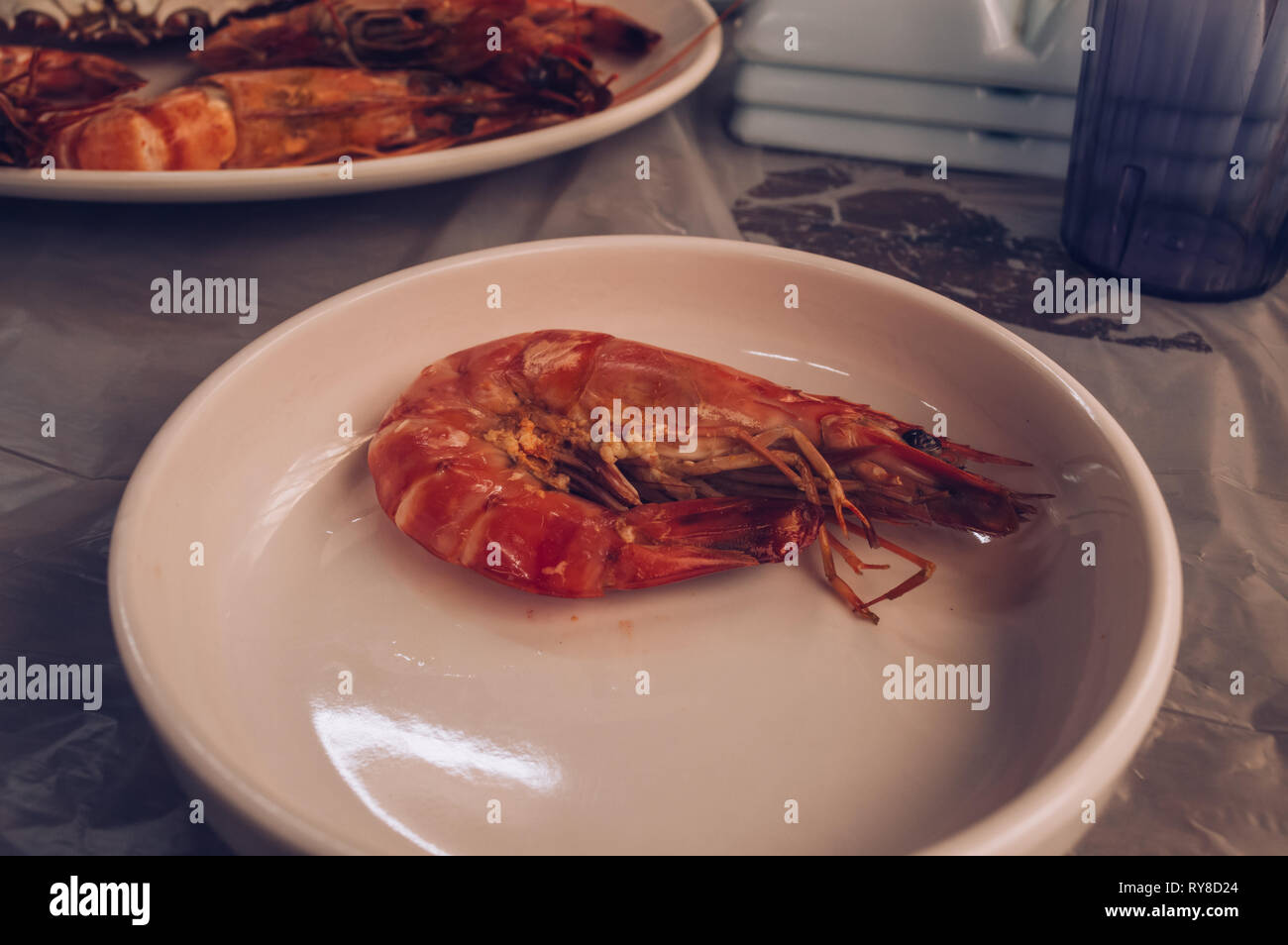 oneserving of  boiled shrimp  in white plate Stock Photo