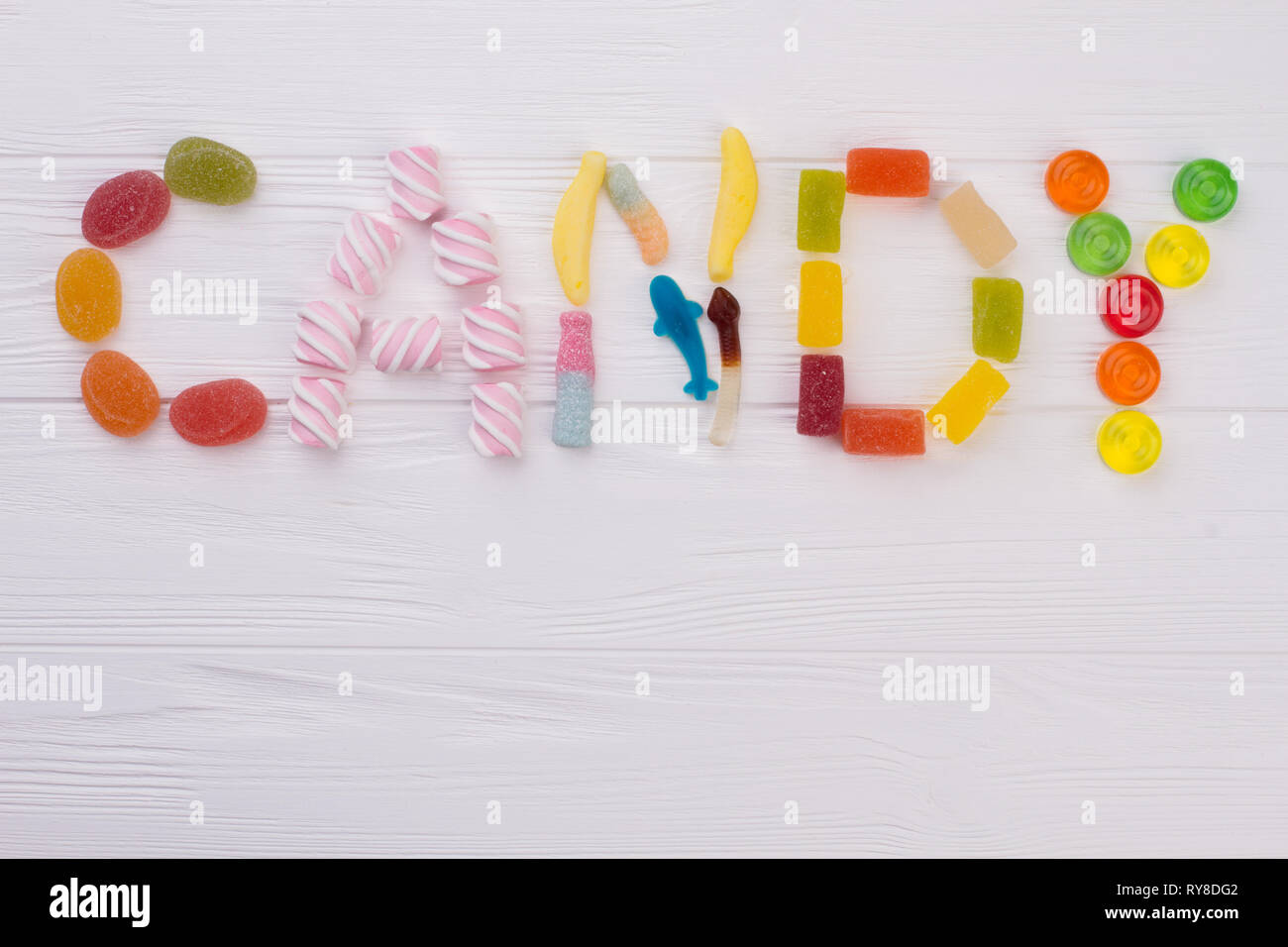 Colourful sweets spelling the word CANDY Stock Photo Alamy